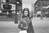 Roger-Viollet | 1409439 | Sheila (born in 1945), French singer, on Piccadilly Circus. London (England), on September 23, 1966. Photograph from the collections of the French newspaper  France-Soir . Bibliothèque historique de la Ville de Paris. | © Fonds France-Soir / BHVP / Roger-Viollet